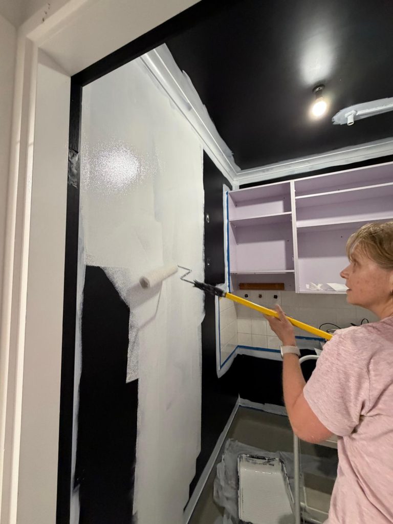 Sharon painting the lab